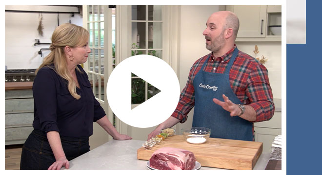 Cook's Country cast members Bridget Lancaster and Bryan Roof making Cuban Sandwiches