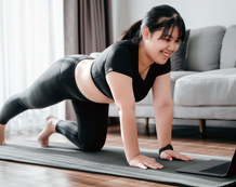 a woman doing exercises in her home