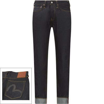 Autentiske Evisu jeans er fremstillet i en raw-denim med selvedge. Håndprintet måge på baglommerne. Indigo farven vil kun klæbe til overfladen af ​​stoffet, så farven vil falme naturligt efter vask. Made in Japan. Wash-Effect Seagull Jeans