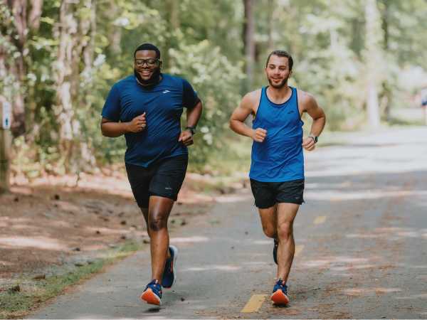 Two men running on a path