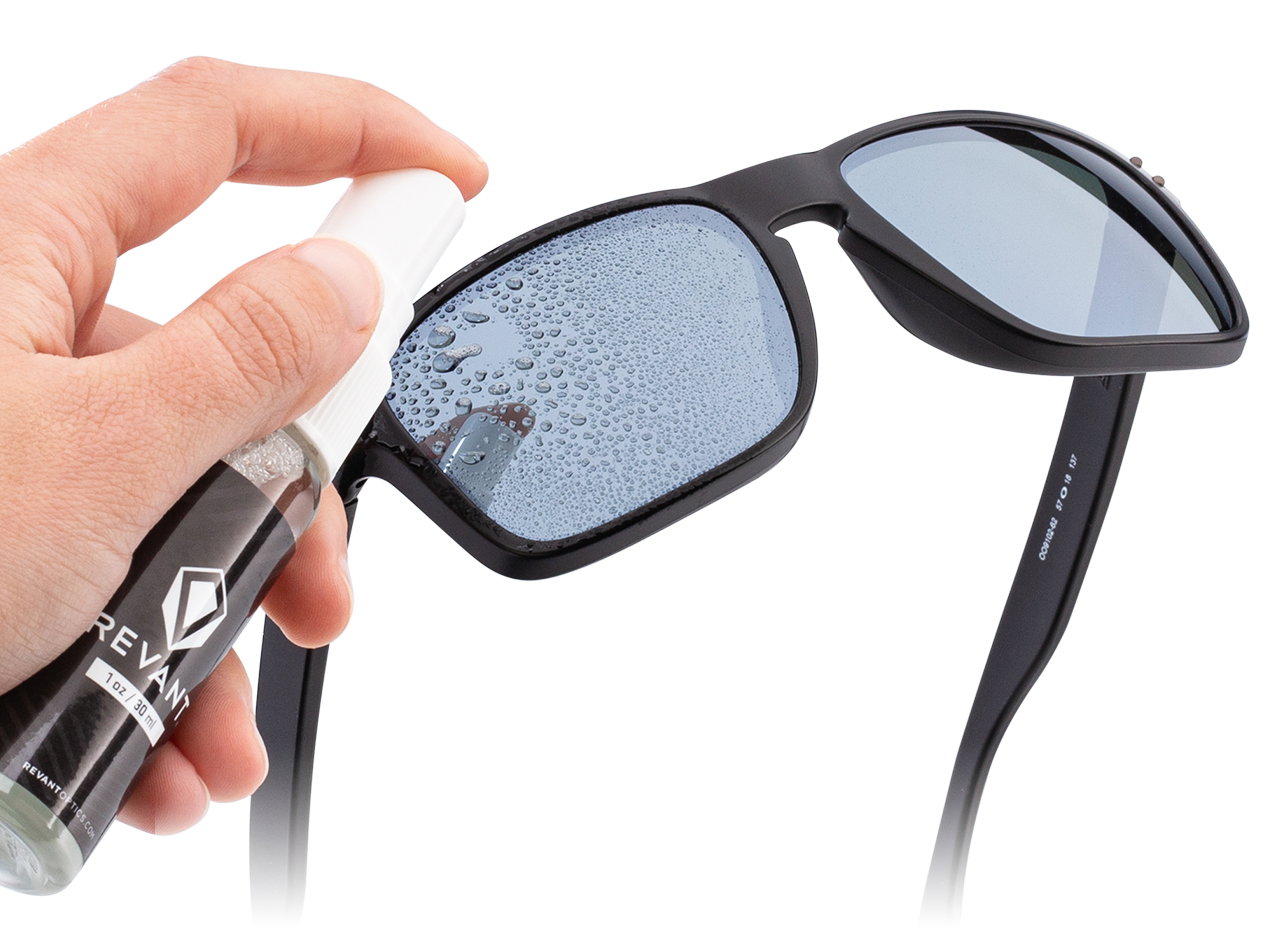 Anti-fog spray being applied to lens