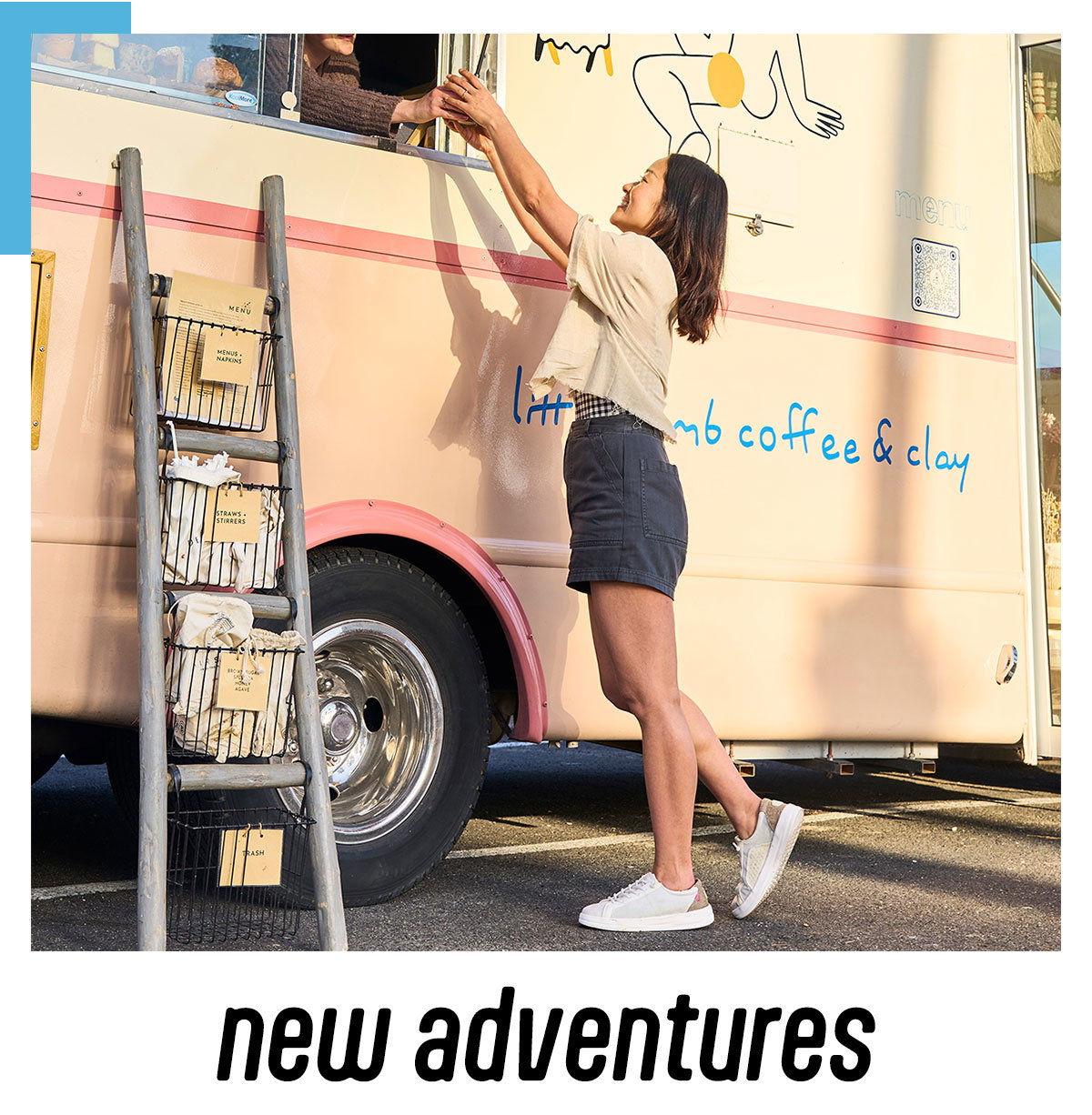 Women getting coffee from a truck in HEYDUDE shoes.