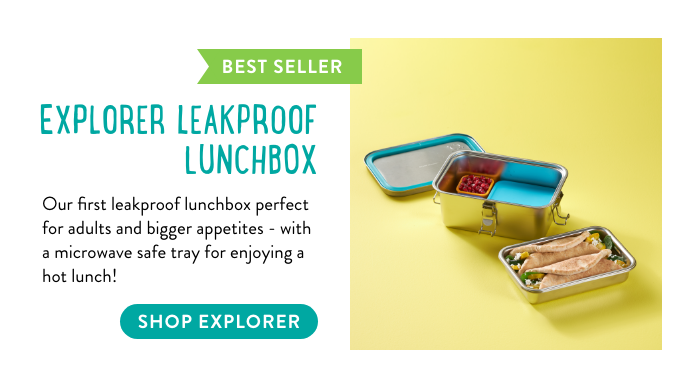 Text: Explorer leakproof lunchbox. Our first lunchbox with a microwave safe tray for enjoying a hot lunch! Button: Shop Explorer Image: Explorer lunchbox open view with wrap in removable tray.