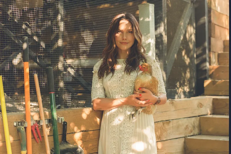 Sophia Bush in front of her coop designed by John Sharp Studio.