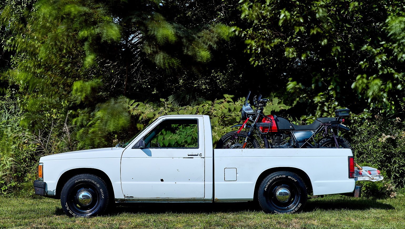 A few mods makes a mini pickup a cheap motorcycle hauler