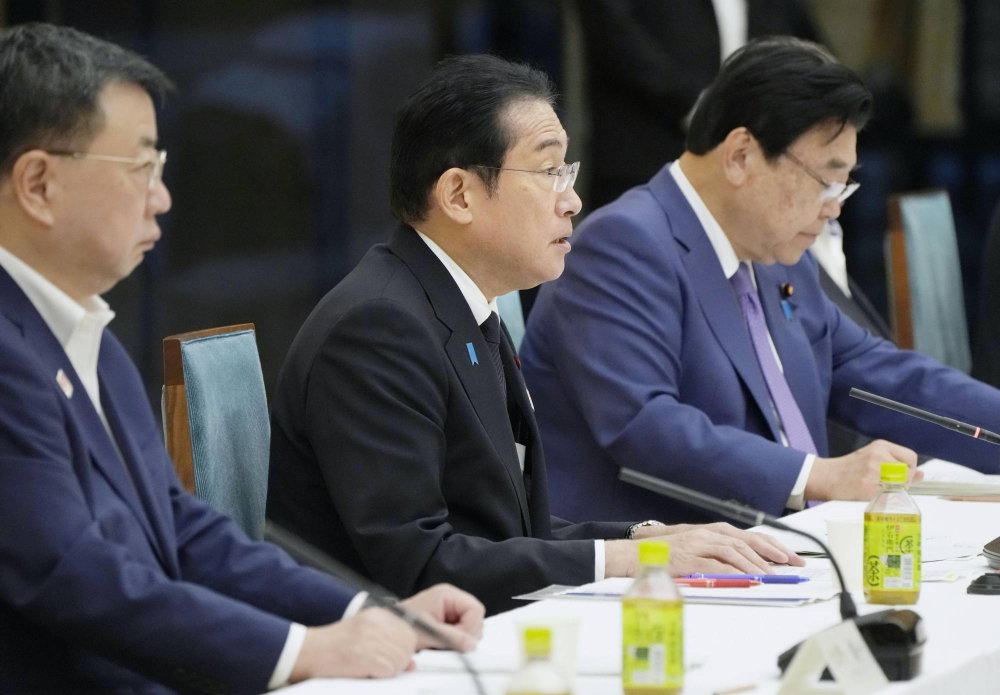 Economists question the wisdom of Kishida's new minimum wage target