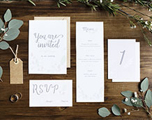 Photo of a collection of invitations.