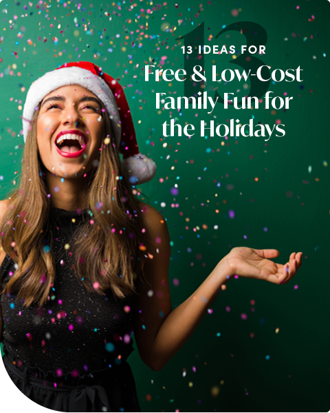 13 Ideas For Free & Low-Cost Family Fun for the Holidays | Woman laughing in a santa hat