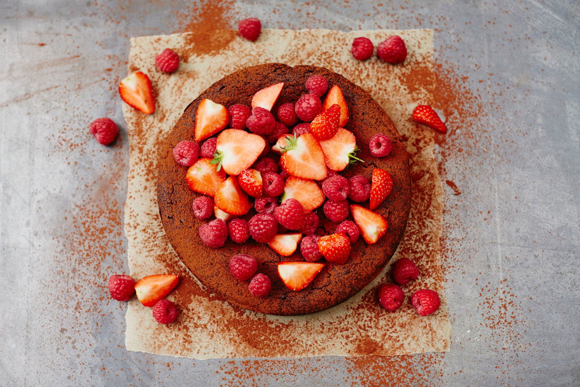 Flourless chocolate cake with berries on top