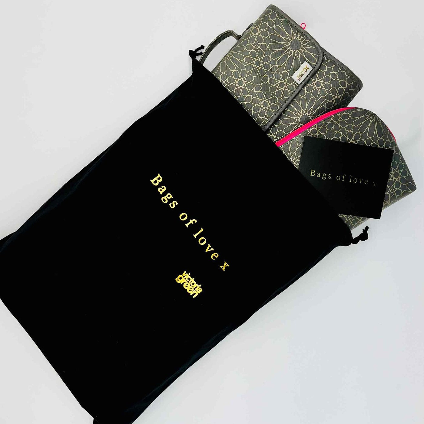 Gift bag with makeup bag and wash bag inside