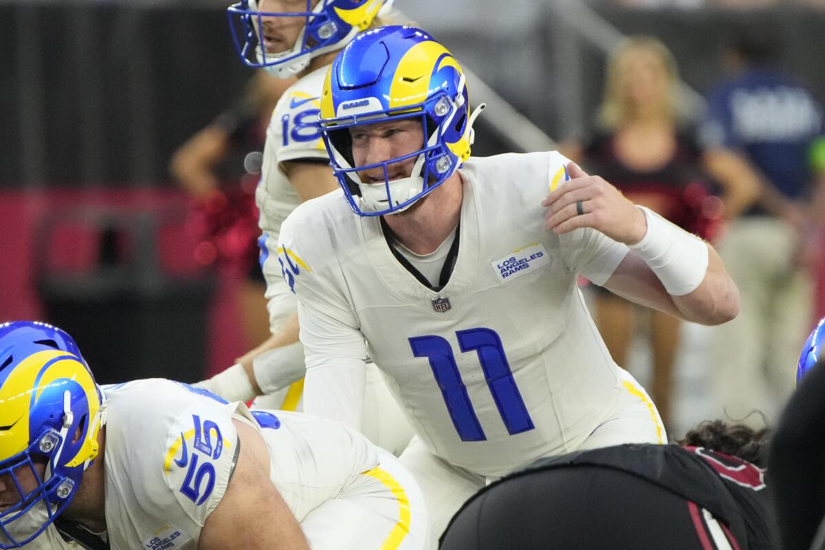 Rams quarterback Carson Wentz lines up against the Arizona Cardinals.