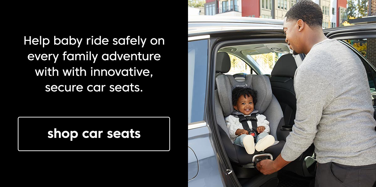 Help baby ride safely on every family adventure with innovative, secure car seats. Shop car seats button. Man securing a smiling baby in a car seat.