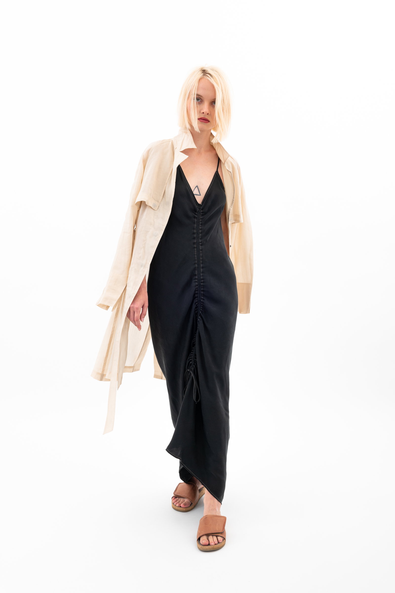woman wearing jacket and dress
