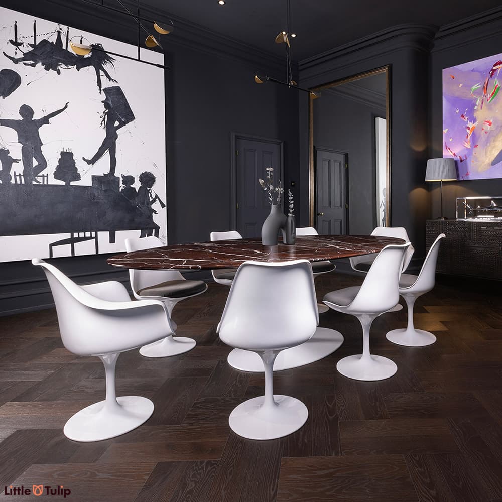 Angled end on view of 244 Levanto Rosso Table with 6 sides, 2 arm chairs