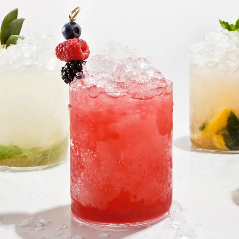 Image may contain: Drink, Cocktail, Alcohol, Beverage, Mojito, Milk, and Plant