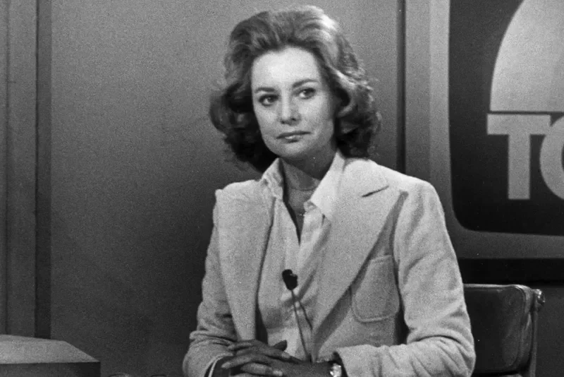 black and white image of Barbara Walters at newsdesk, TODAY logo in background to right