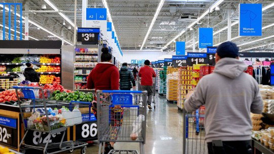 Shoppers in Walmart aisles