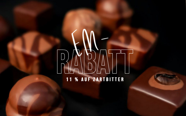 Stimmungsbild mit Zartbitter Oralinen und dem Text EM-Rabatt 11 % auf Zartbitter