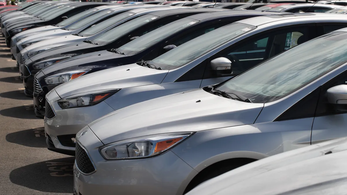 Ford Focus compact cars are offered for sale at a dealership on June 20, 2017 in Chicago, Illinois.