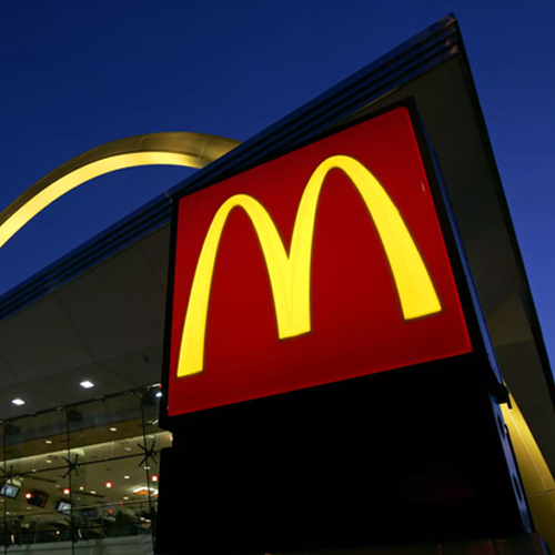 The McDonald’s restaurant logo and golden arch is lit up in Chicago.