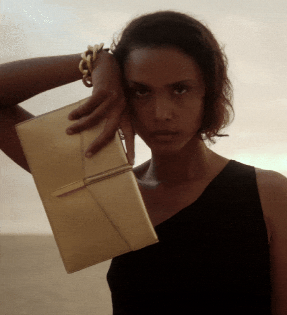 the tokyo clutch in gold smooth