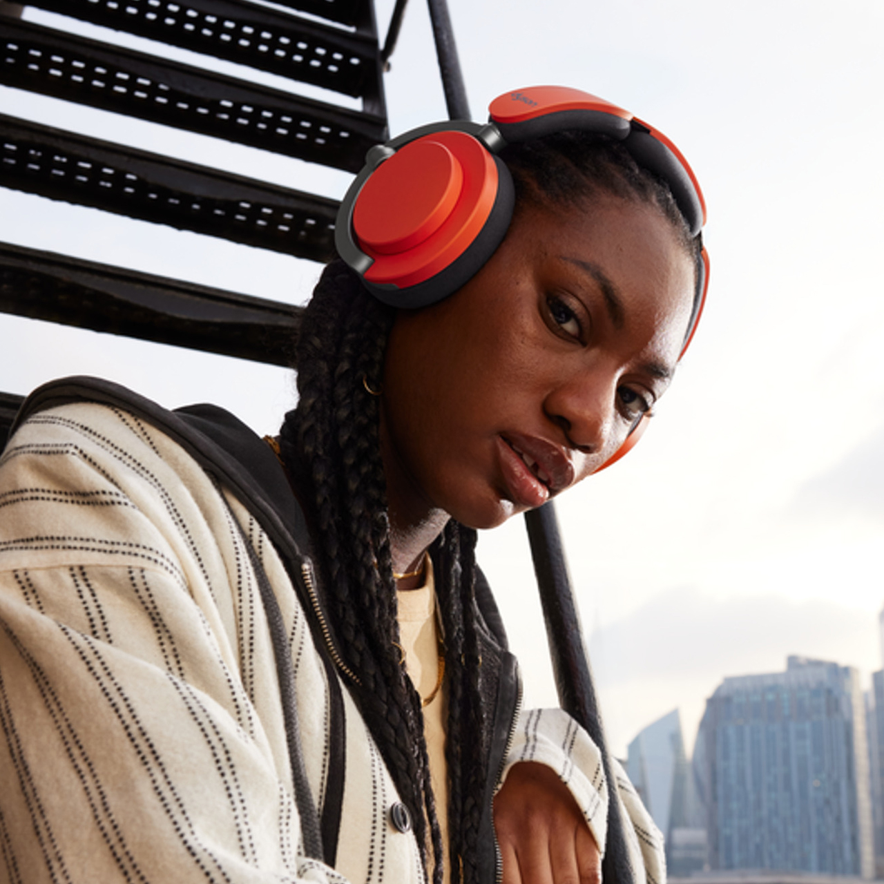 A model wearing Dyson OnTrac headphones.