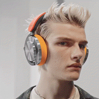 A model wearing Dyson OnTrac headphones.