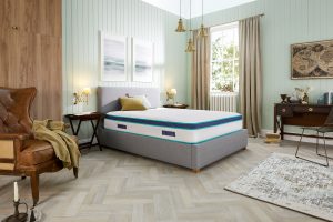 a bedroom with a bed in the middle of it