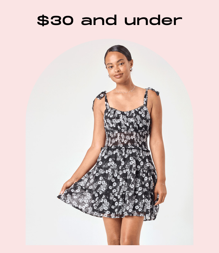 $30 and under, girl with black dress white daisy print and shoulder ties.