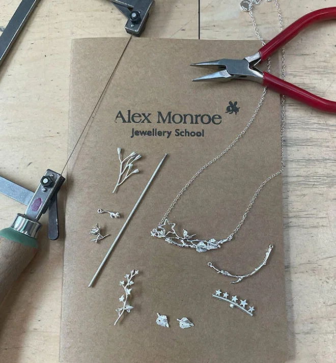 Flatlay of the jewellery pieces that form a necklace