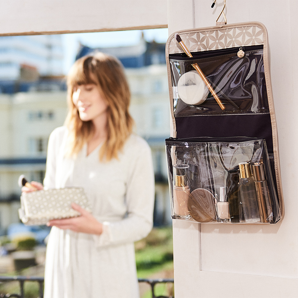 Hanging makeup bag in gold