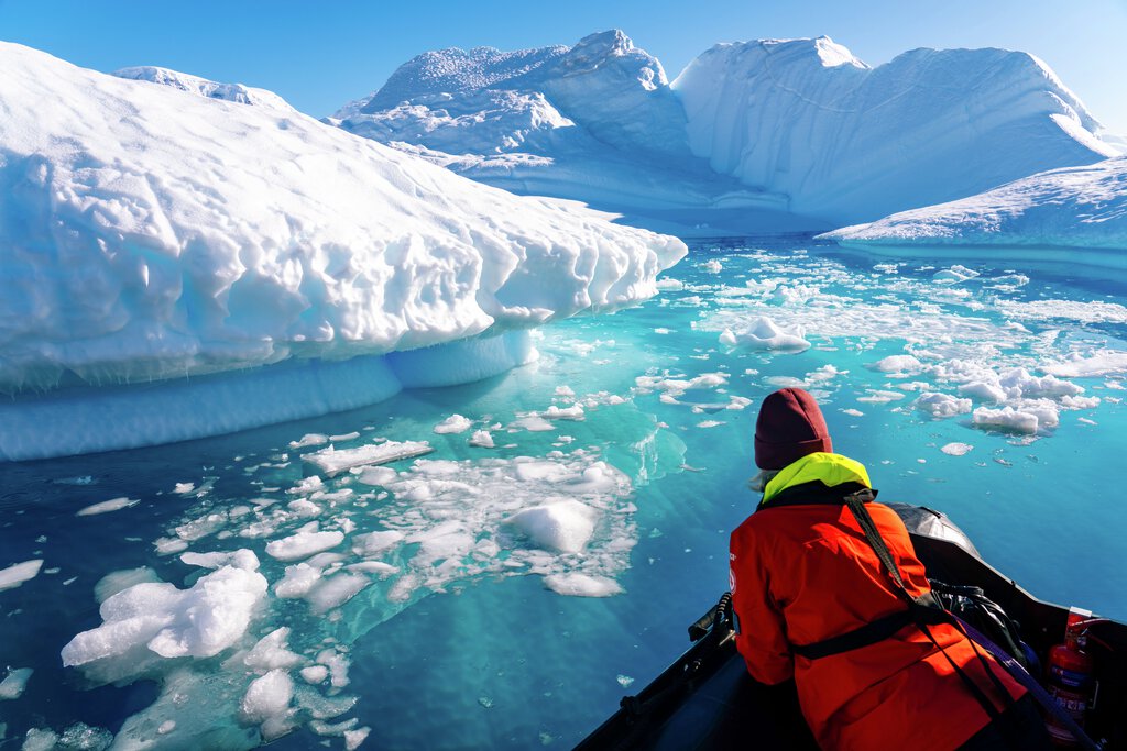 Expedition boat cruising in Neko Harbor, Antarctica.