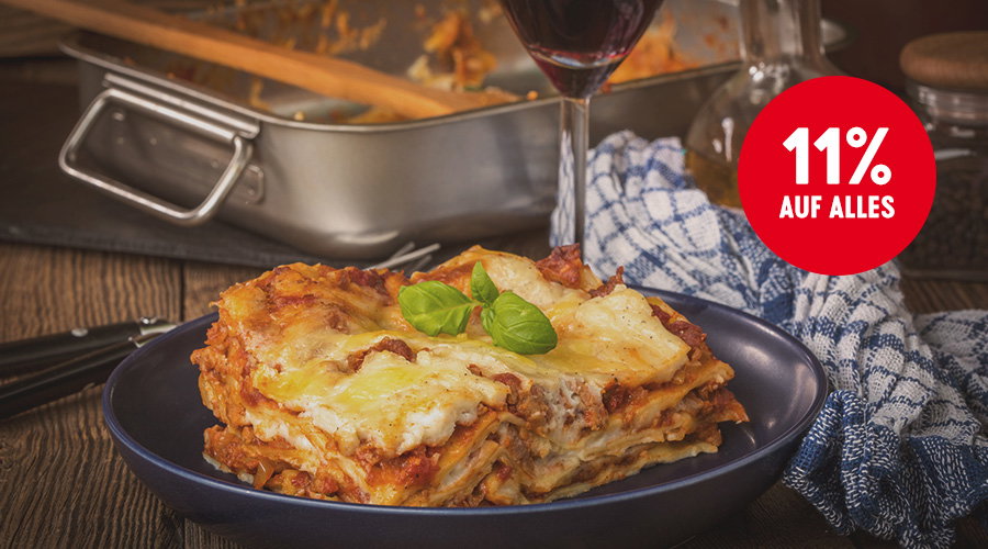 Lasagne auf einem Teller. Text: 11% auf alles