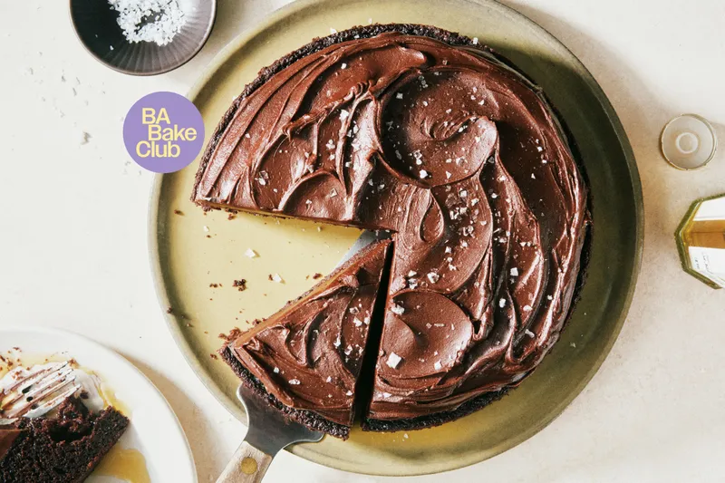 A chocolate cake made with olive oil and topped with flakey sea salt.