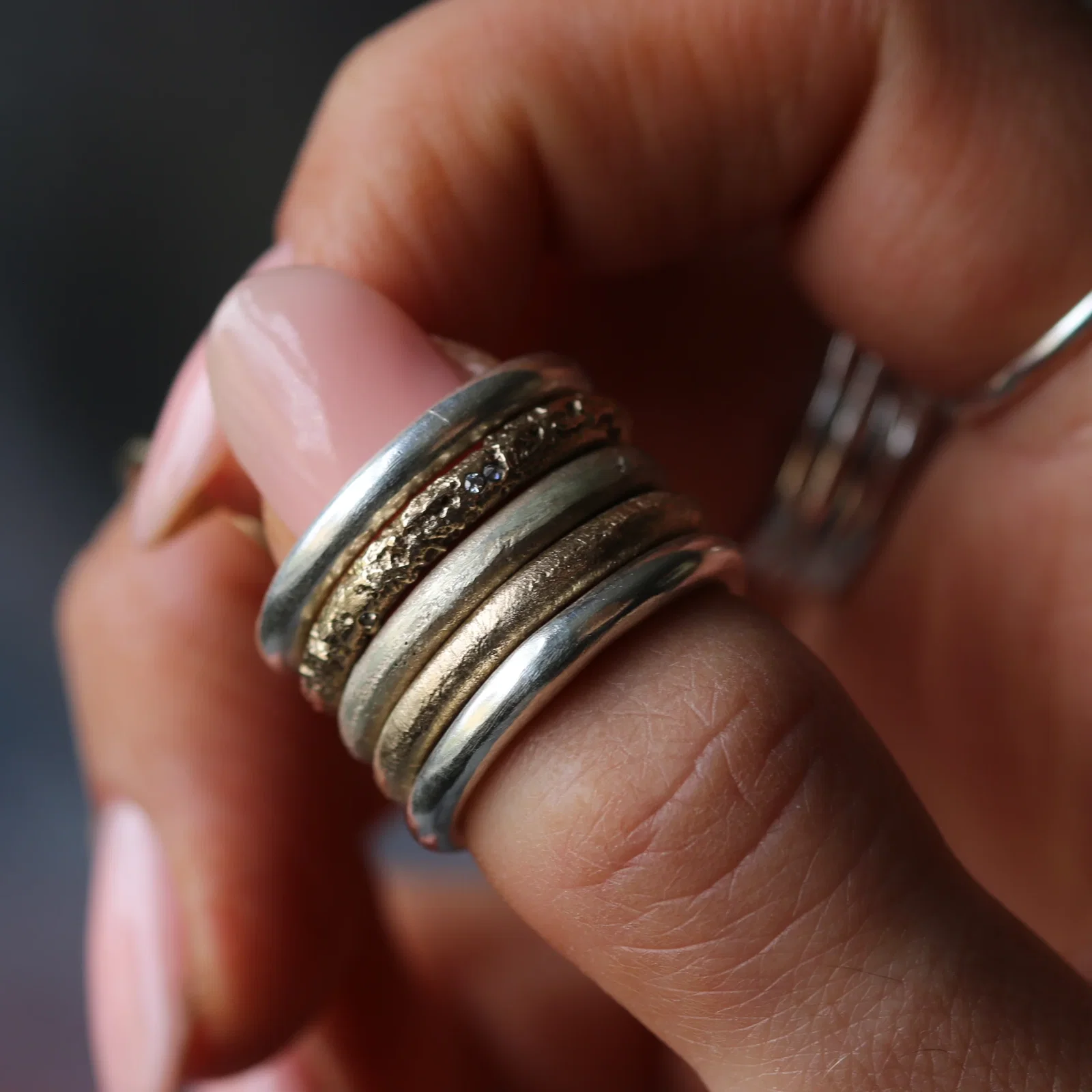 Image of Sand Cast Sterling Silver Ring with Moissanite Stones