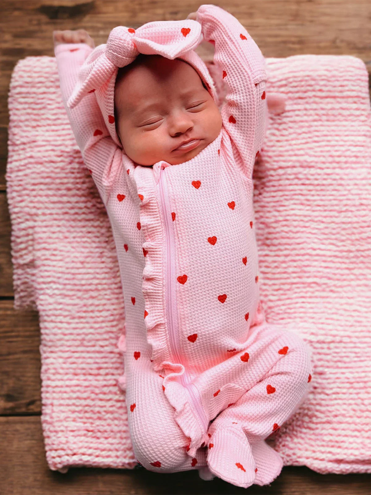 Image of Organic Waffle Ruffle Zip Footie, Little Red Heart (on Pink)
