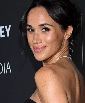 InStyle: Meghan Markle's pleated periwinkle dress is a complete 180 from  her royal style | Milled
