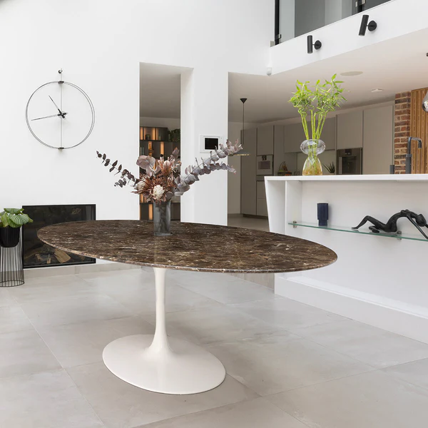 Angled end view of Emperador 244 Tulip Table