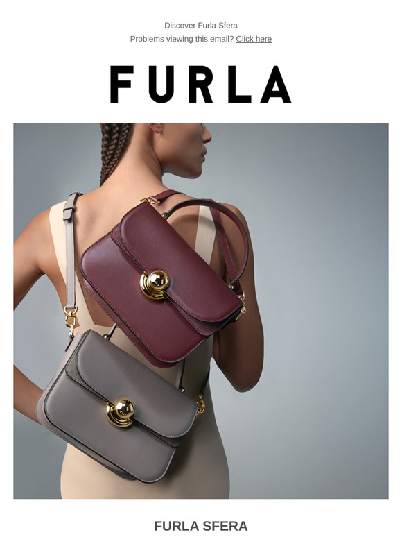 Wear it by hand or crossbody