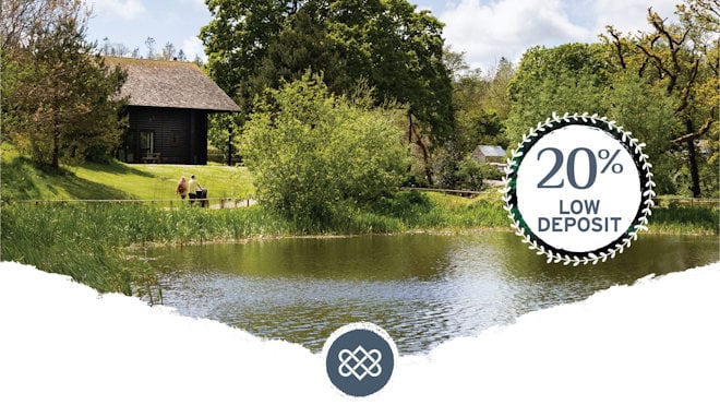 family walking past bluestone lake with 20% low deposit logo overlayed