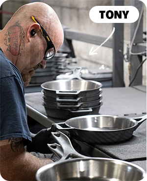Tony smoothing out edges of the skillet