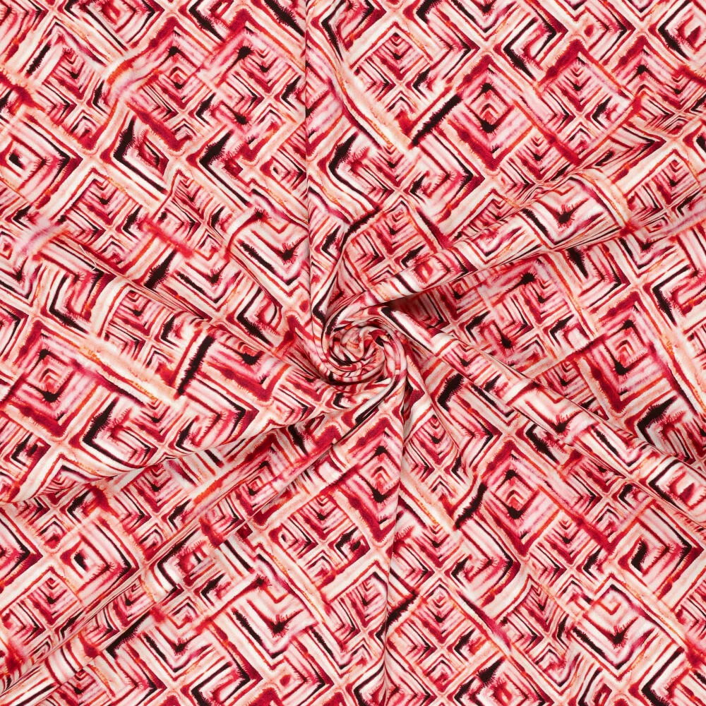 stretch katoen met rood oranje grafisch dessin <br>