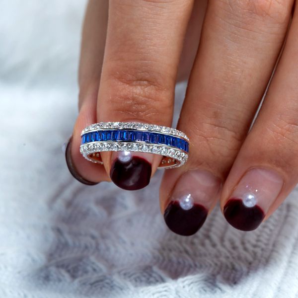 Triple Row Created White & Blue Sapphire Eternity Wedding Band
