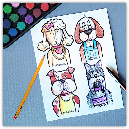 A whimsical illustration of four different dog breeds dressed in human clothes, including a Poodle, Hound, Bulldog, and Terrier, each labeled with their breed name. The artwork is shown next to a palette of watercolors and a paintbrush on a blue desk surface.