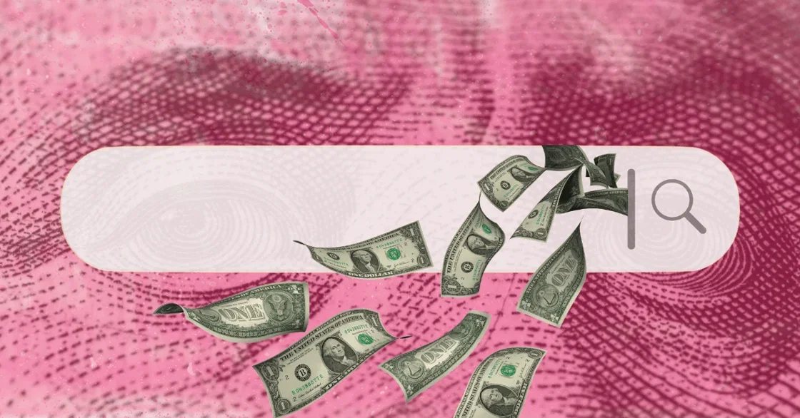 A search bar with dollar bills falling out.