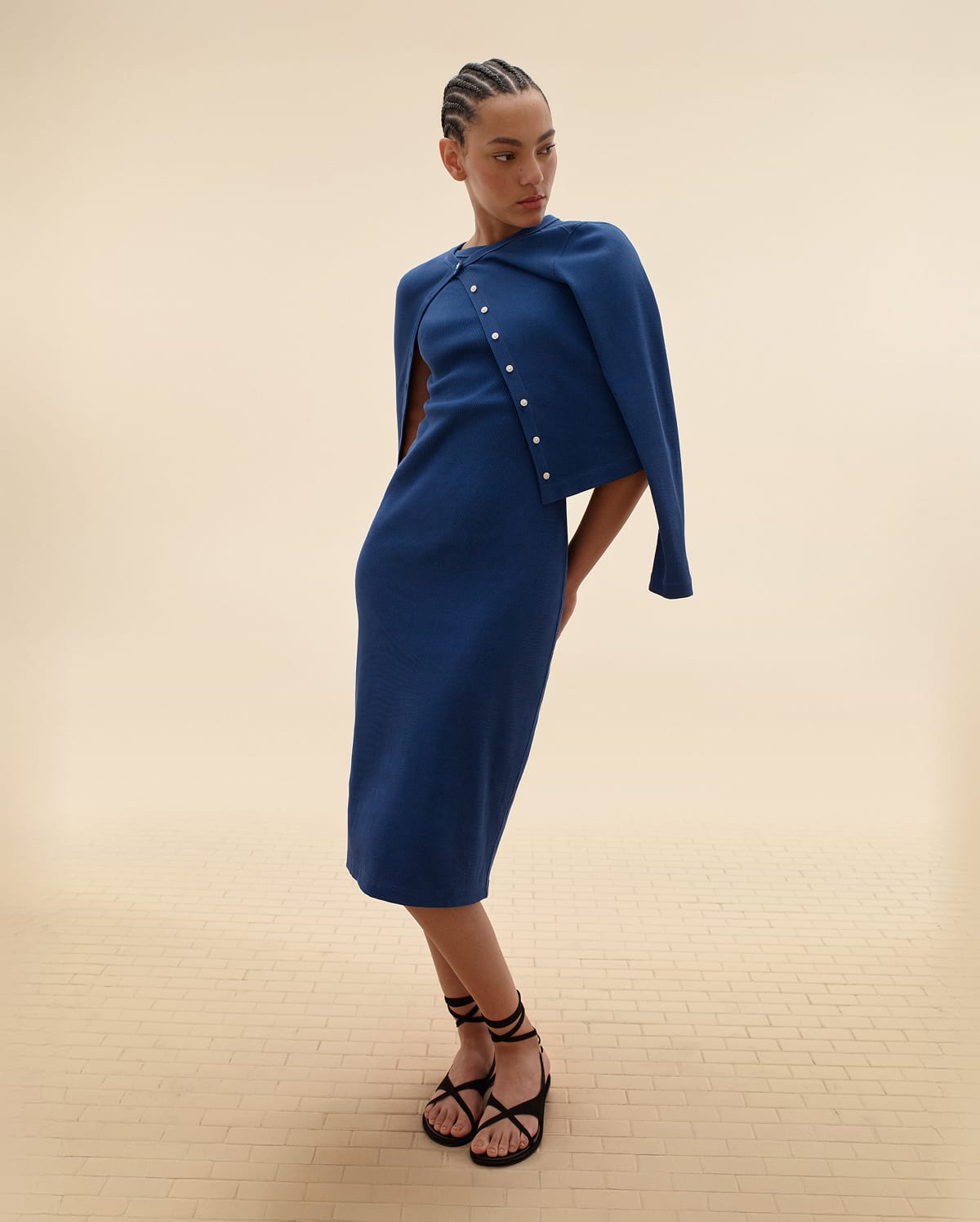 [Editorial Image]Model in The Selfie Cardigan | The Selfie Tank Dress | The Leather Criss-Cross Sandal 