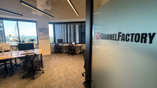 The Channel Factory logo on an office door