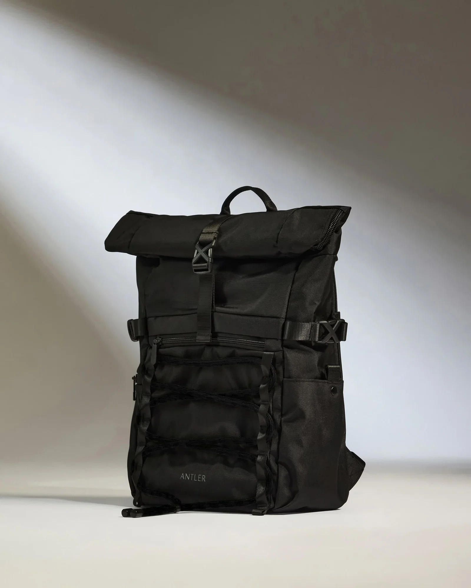 Image of Discovery Roll Top Backpack in Black