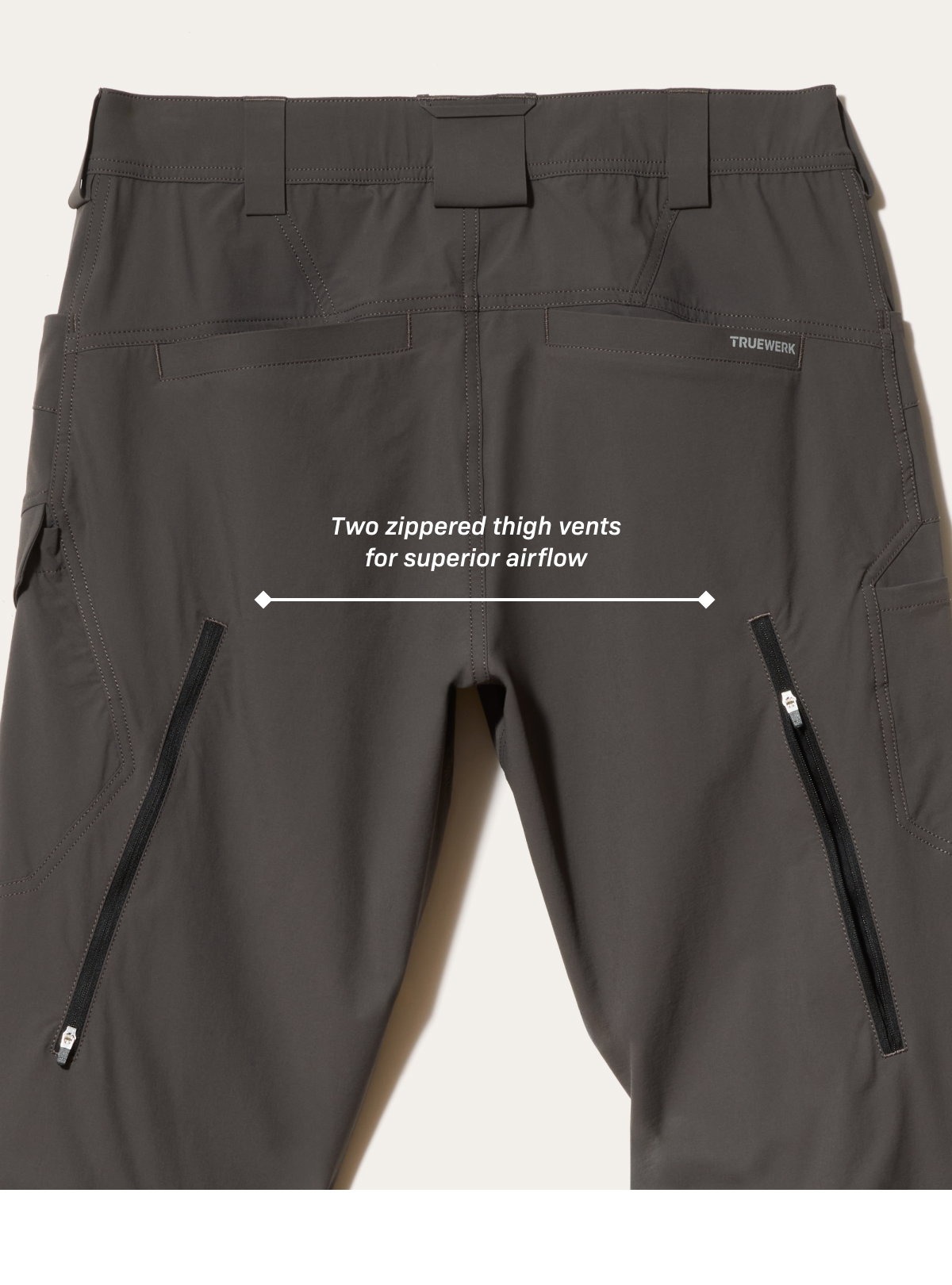 Close up of T1 WerkPant Pro in Deep Grey, with two zippered thigh vents for superior airflow 
