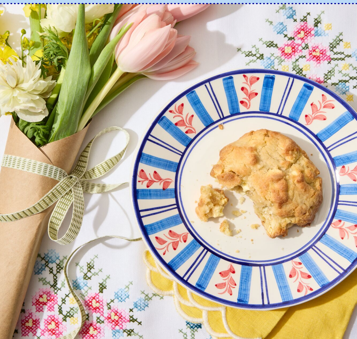 Lemon Cookie and Flowers on Spring Table